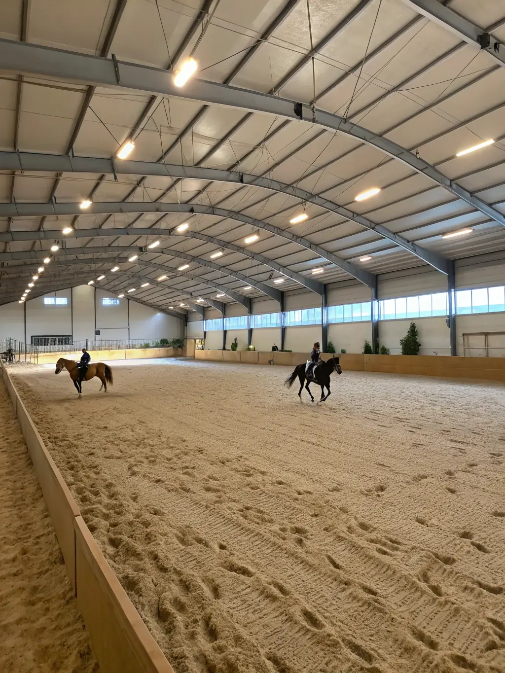 A scenic shot of the equestrian facilities at TEV, highlighting the well-maintained arenas, stables, and surrounding natural environment.